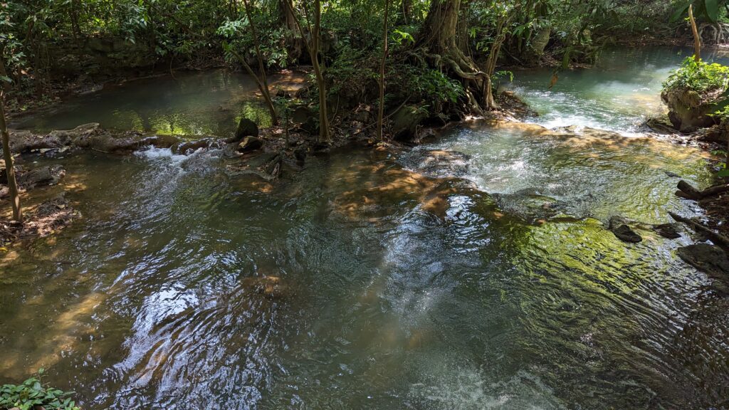 Numerous natural rockpools with flowing water into bigger pools at Thanbok Khoranee National Park
